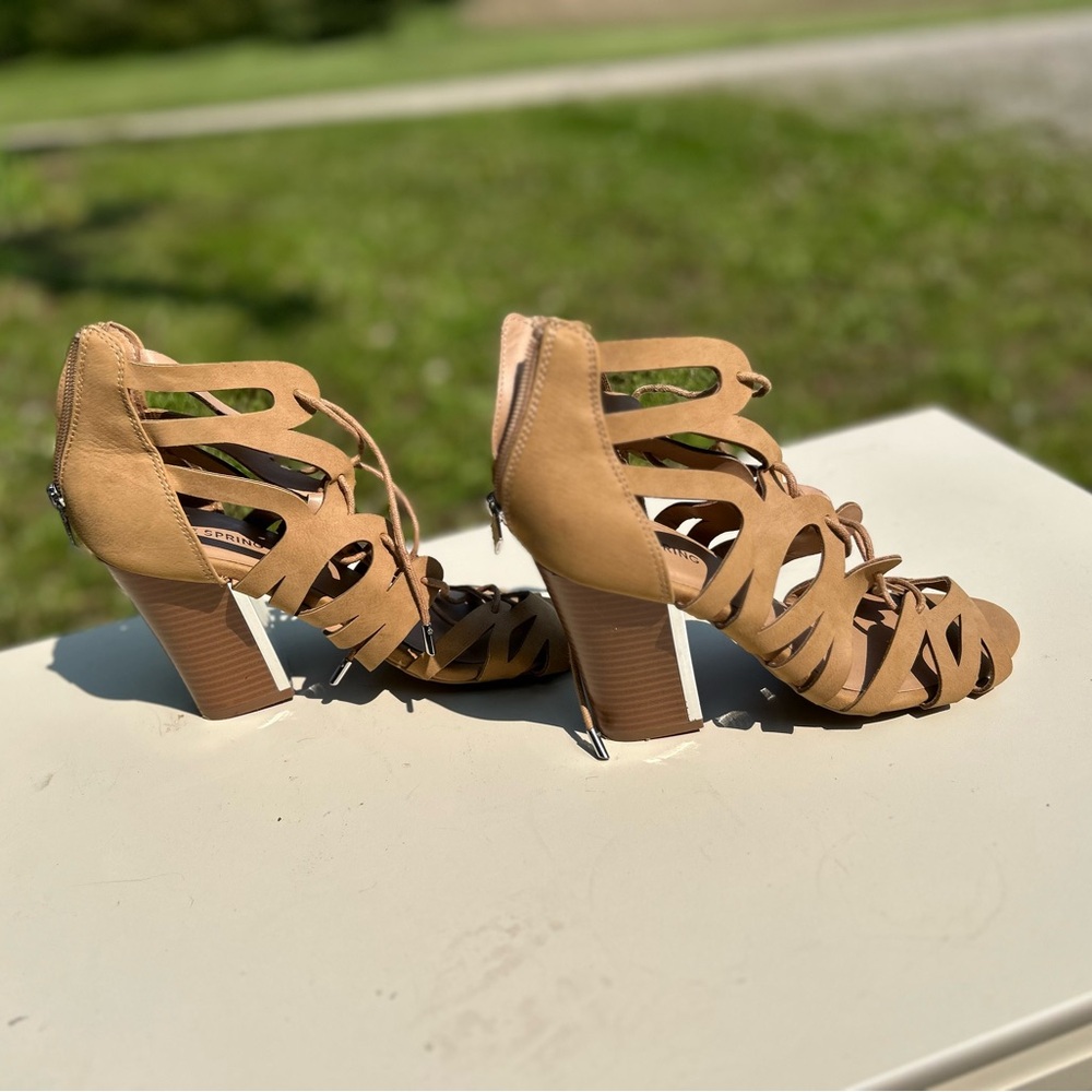 Tan Strappy Heeled Sandals
Call it spring